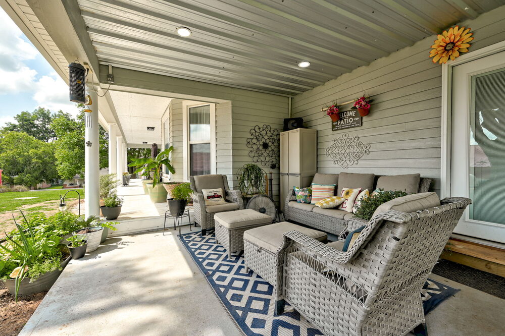 The wrap-around porch, furnished and ready for slow mornings